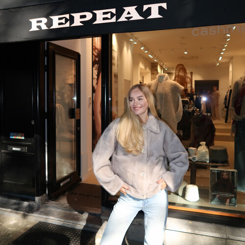 Korte omkeerbare faux fur jas